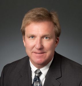 headshot of former Port KC Chairman George Wolf